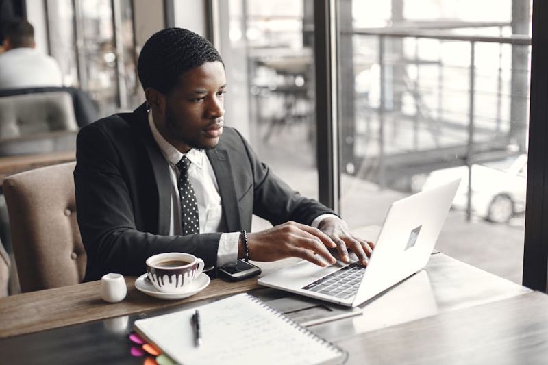 entrepreneur working laptop coffee shop